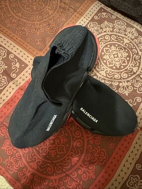 NWOT Men’s Black Sock style speed trainer Sneakers with Red Sole Accent